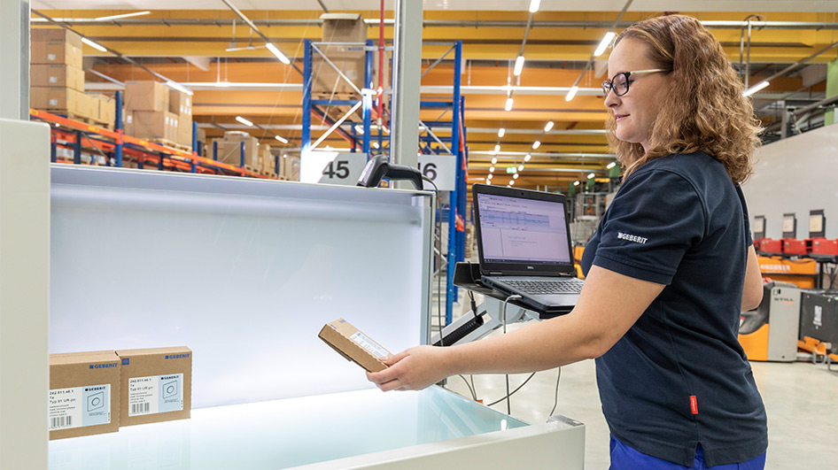 Martina Schaerer prepares smaller deliveries for shipment.