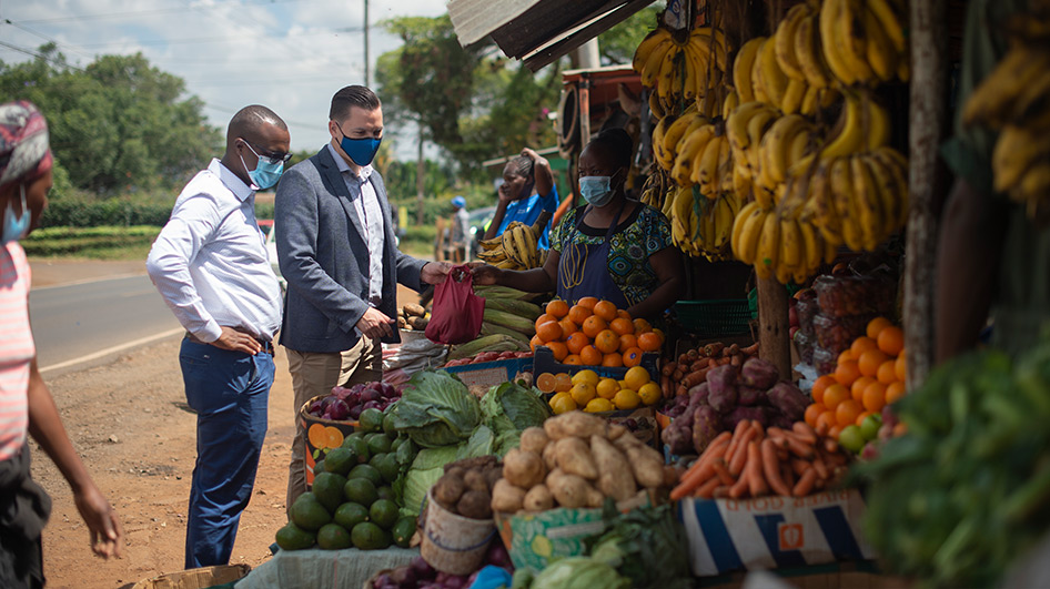 A range of bright, healthy products: Manuel Balmer (centre) visits the market in Nairobi almost every day.