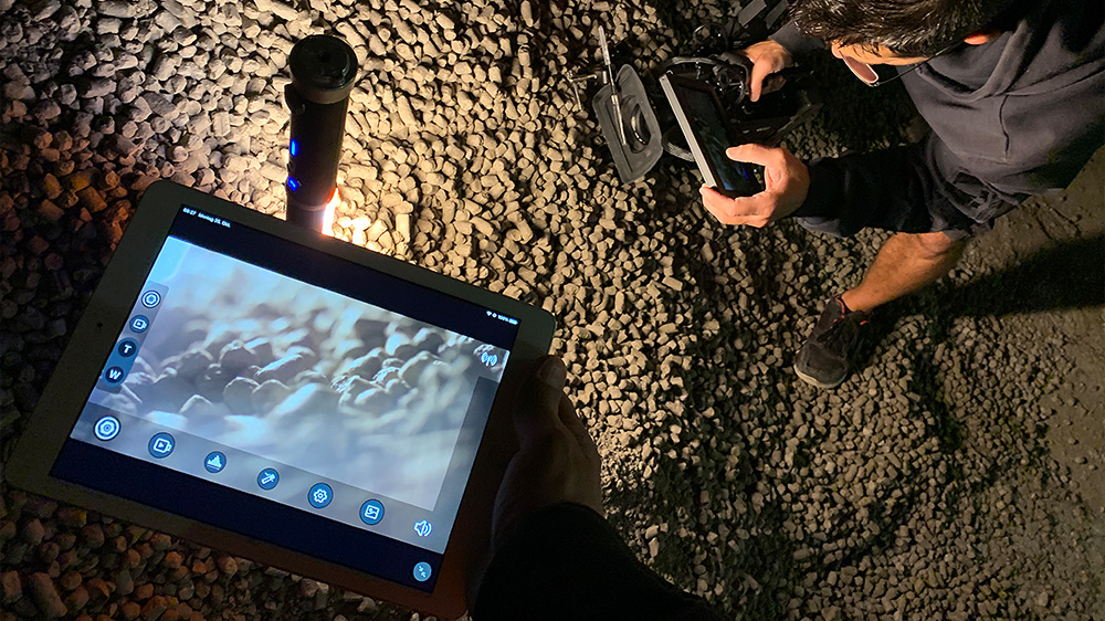 Cameraman Roman Linder takes close-up shots of the clay