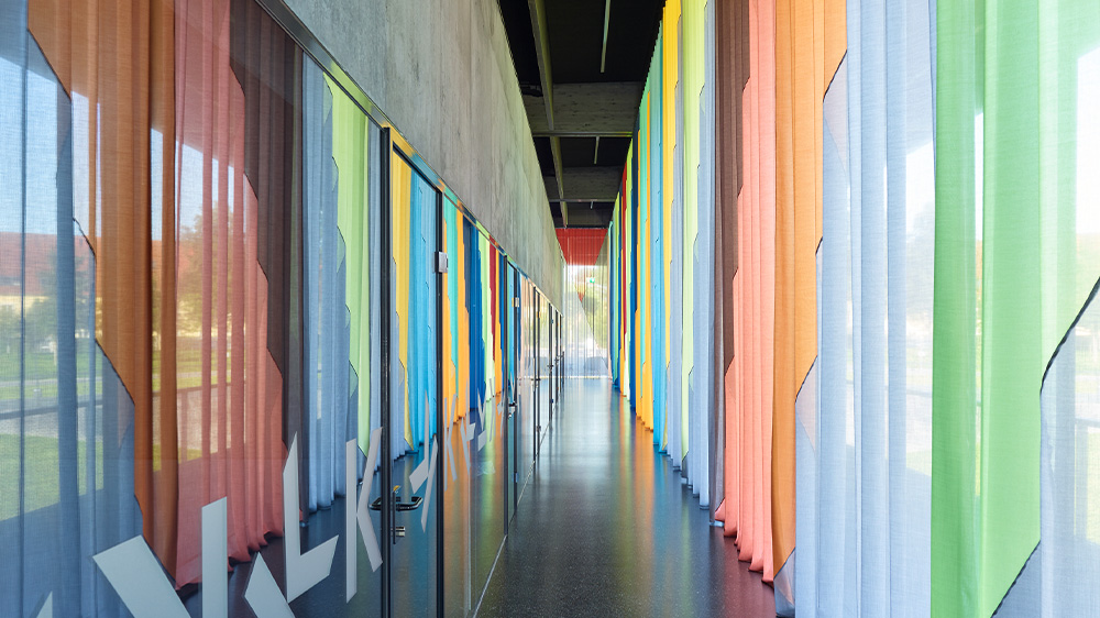 The colorful curtains on the inner facade 