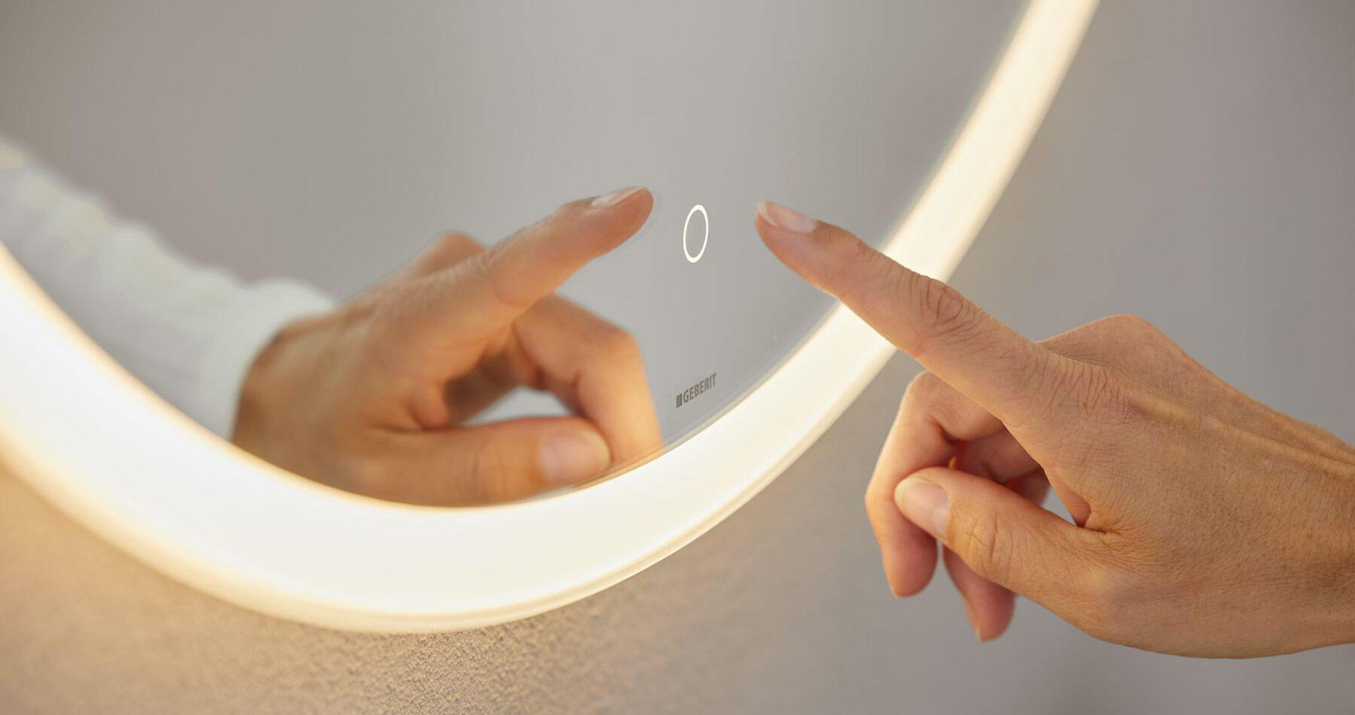 Geberit Option illuminated mirror with touch control for optimal lighting and a clear reflection