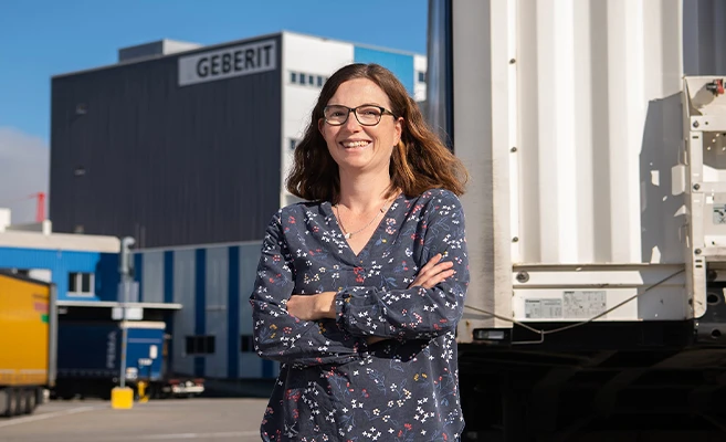 Julia Dreher, Head of Group Logistics, in front of the Geberit logistics centre in Pfullendorf