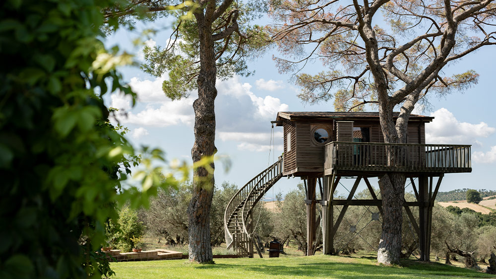 The bathroom fittings with Geberit shower toilets in this tree house in Italy may come as a surprise