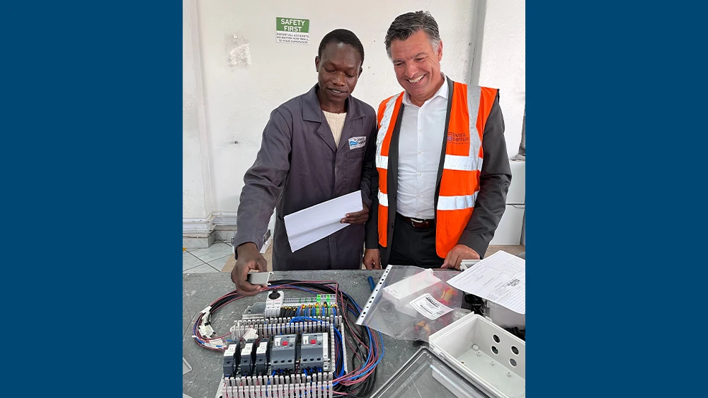 Apprentice Brandon Odhiambo explains how a switchbox for water pumps works