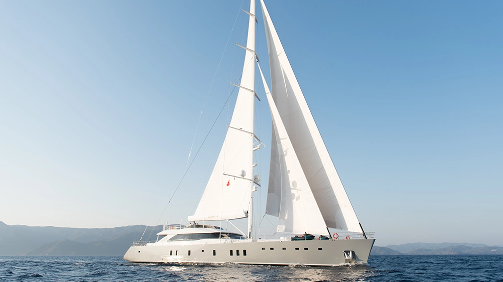 A yacht built at the ADA Yacht Works in Bodrum glides across the water.