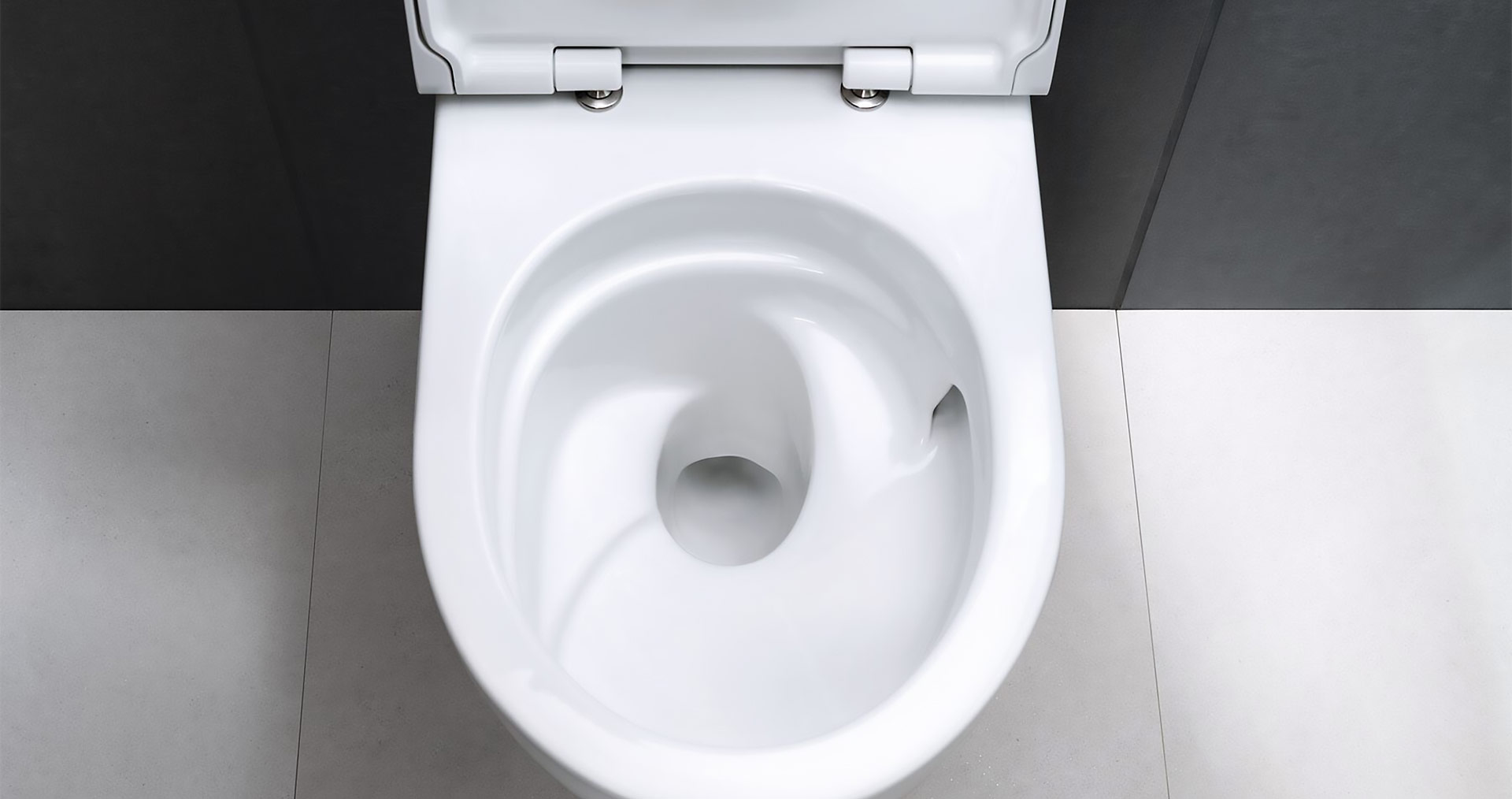 Geberit Acanto Toilette mit verbesserter TurboFlush-Spültechnologie, umgeben von modernen, schlichten Fliesen
